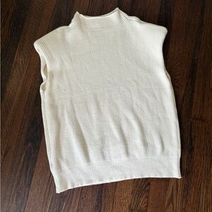 Amazon white sleeveless turtleneck sweater with shoulder pads